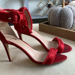Mix no. 6 red fringed heels. Worn a hand full of times still in good condition